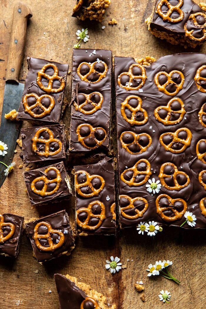 overhead photo of Chocolate Covered Brown Butter Krispie Treats with knife in photo