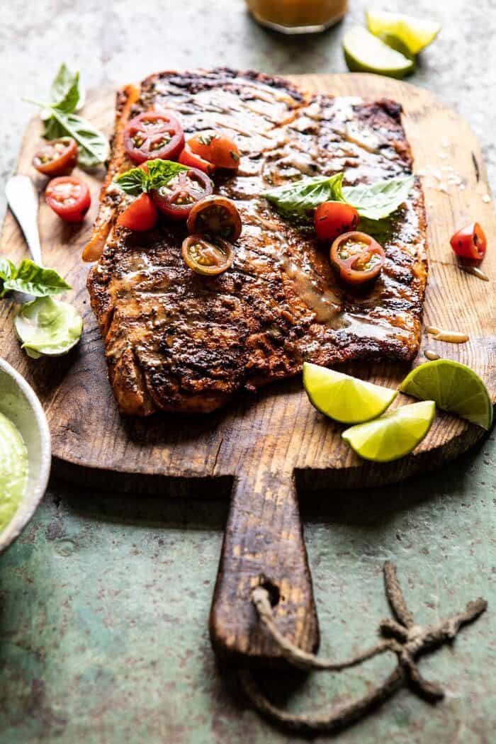 side angled photo of Honey Mustard Grilled Salmon with Avocado Basil Sauce