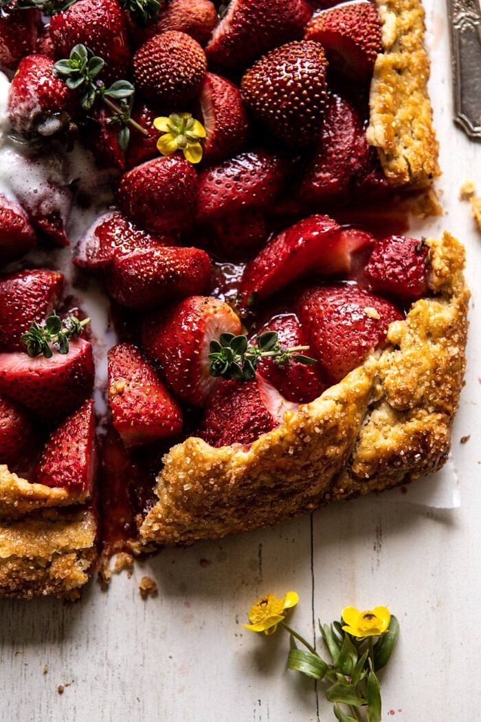 Jammy Strawberry Galette | halfbakedharvest.com #strawberries #tart #summer #fruit #springrecipes overhead close up photo of Jammy Strawberry Galette