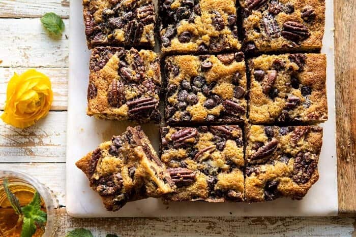 Kentucky Derby Pie Chocolate Chip Cookie Bars | halfbakedharvest.com #cookiebars #pecanpie #chocolatechip #dessert horizontal photo of Kentucky Derby Pie Chocolate Chip Cookie Bars