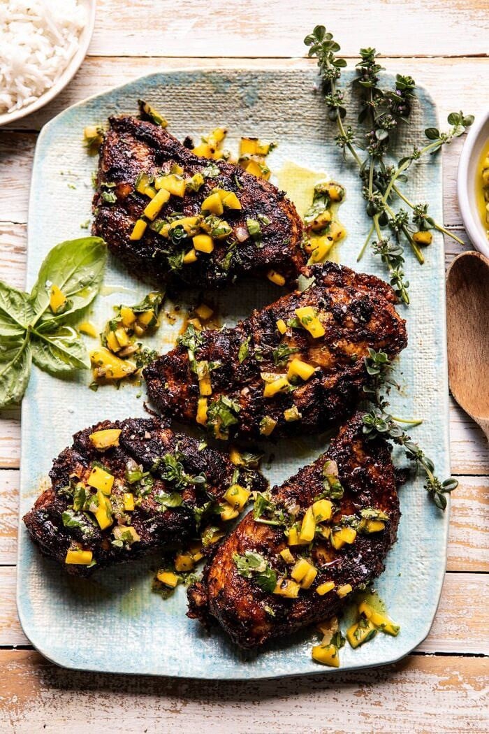 overhead photo of Tropical Jerk Grilled Chicken with Charred Mango Salsa Verde 