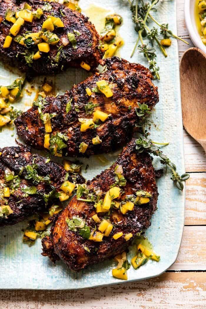 Tropical Jerk Grilled Chicken with Charred Mango Salsa Verde | halfbakedharvest.com #chicken #grilled #easyrecipe #healthy