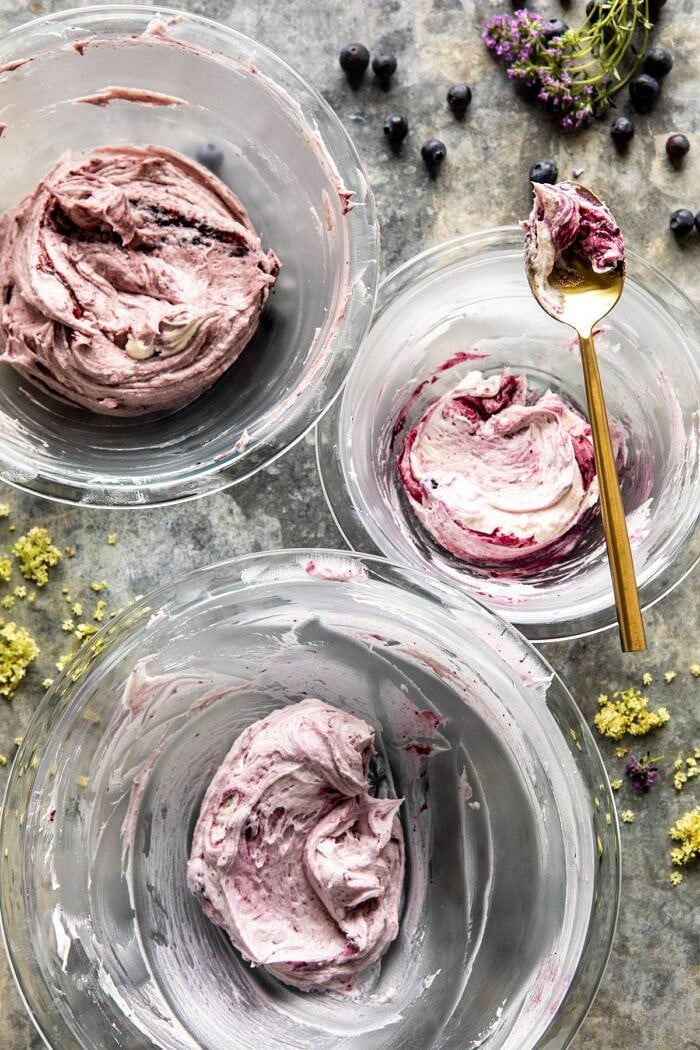 Bursting Blueberry Lemon Layer Cake | halfbakedharvest.com #bleberrycake #layercake #summerrecipes #dessert multi colored buttercream