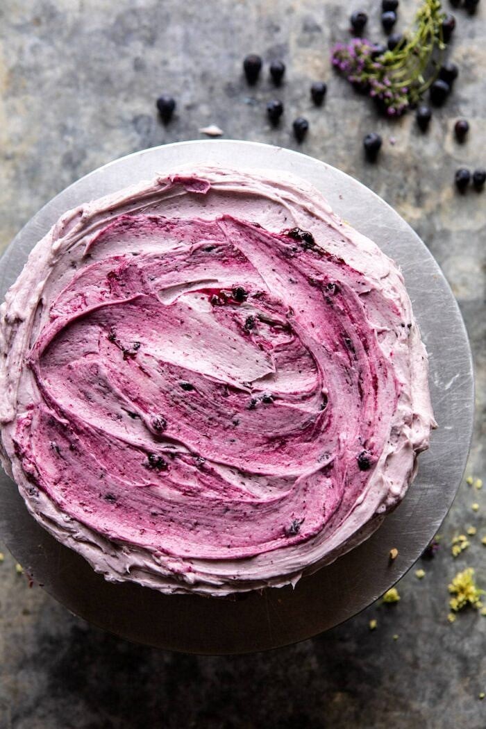 Bursting Blueberry Lemon Layer Cake | halfbakedharvest.com #bleberrycake #layercake #summerrecipes #dessert 2nd cake layer with buttercream