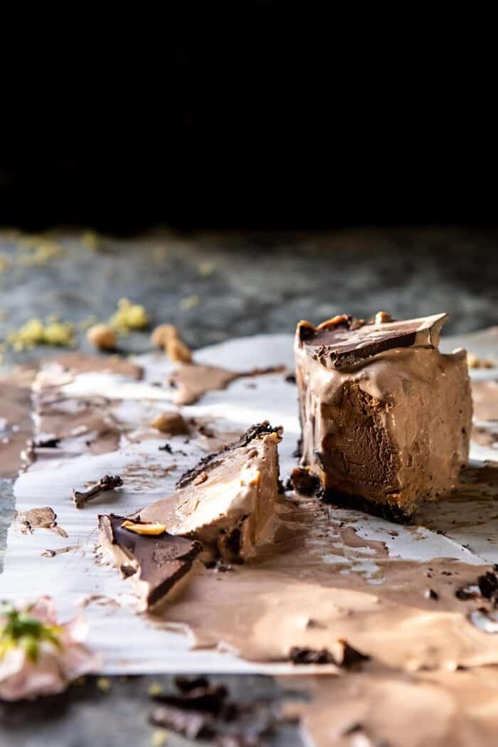 Nonnie's 6 Ingredient Chocolate Peanut Butter Ice Cream Cake | halfbakedharvest.com #icecream #easyrecipes #chocolate #peanutbutter #summer front on photo of Nonnie's 6 Ingredient Chocolate Peanut Butter Ice Cream Cake slice
