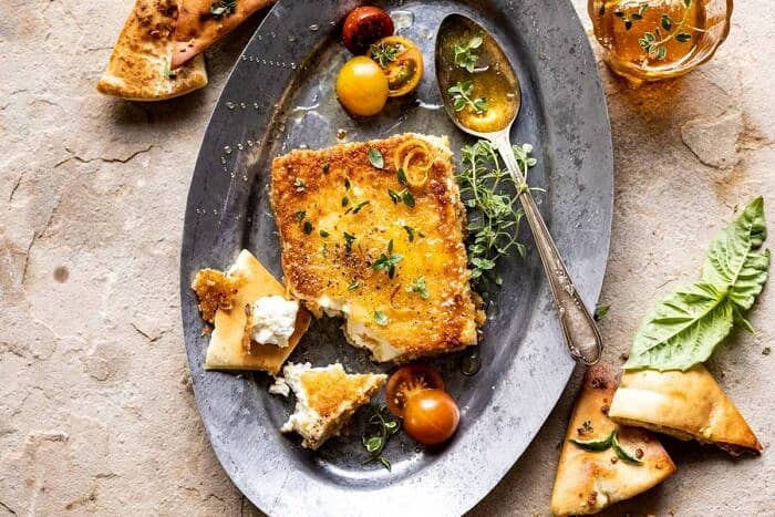 Pan-Fried Feta with Peppered Honey | halfbakedharvest.com #appetizers #easyrecipes #summerrecipes horizontal photo of Pan-Fried Feta with Peppered Honey
