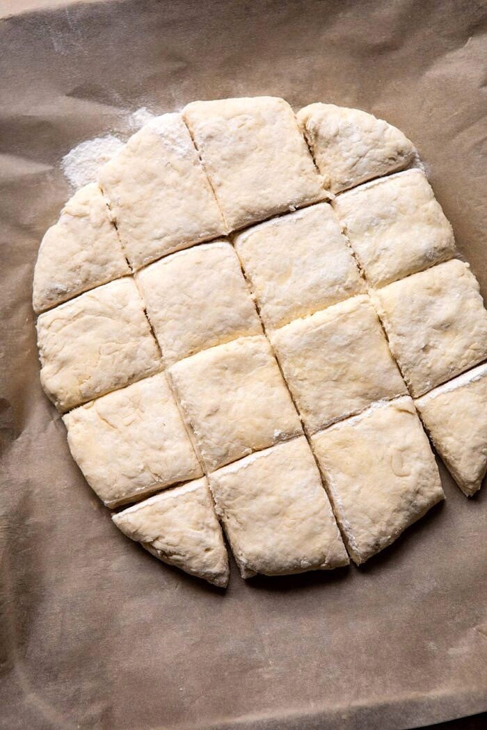 overhead photo of biscuits before being placed on top of blackberries 