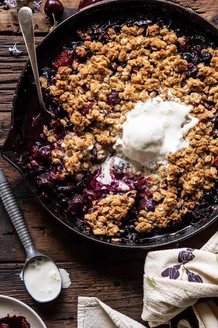 overhead close up photo of Buttery Cherry Berry Skillet Crisp 