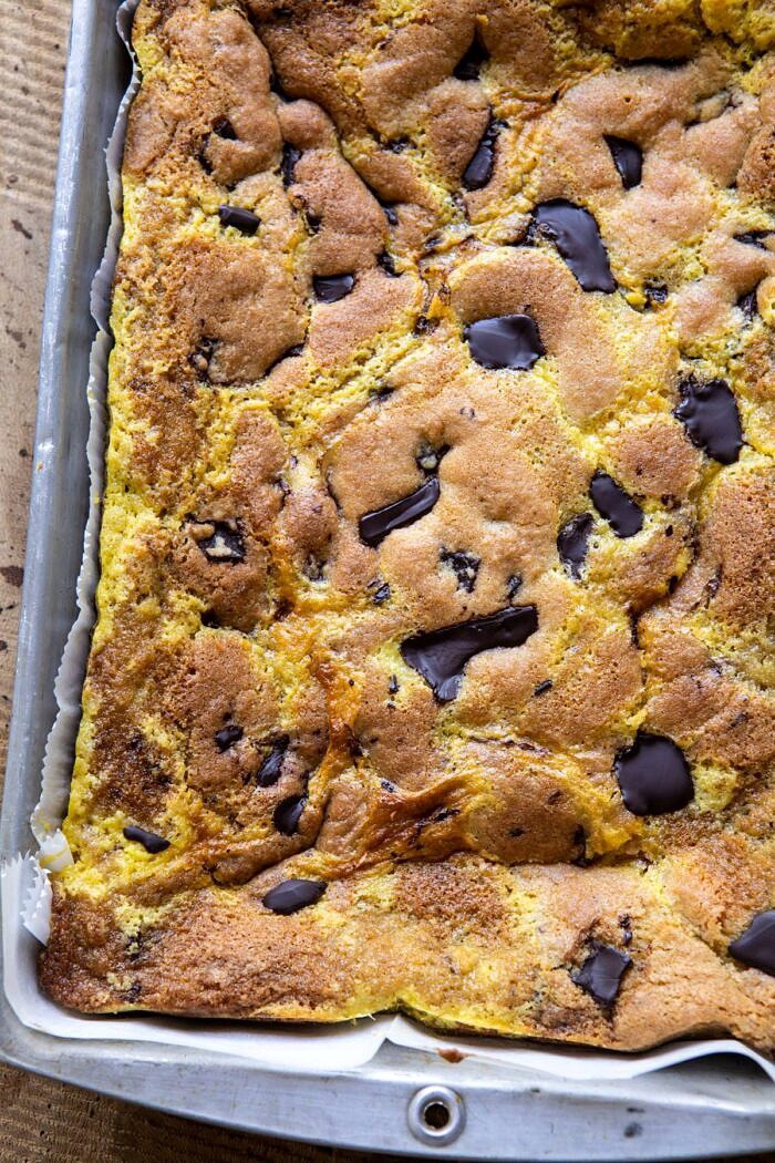 Crème Fraîche Chocolate Chunk Cookie Bars | halfbakedharvest.com #cookies #chocolatechipcookies #cookiebar overhead photo of Crème Fraîche Chocolate Chunk Cookie Bars after baking in baking dish