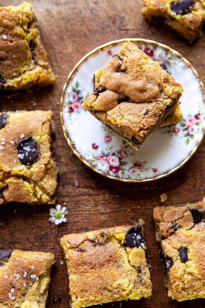 Crème Fraîche Chocolate Chunk Cookie Bars | halfbakedharvest.com #cookies #chocolatechipcookies #cookiebar overhead close up photo of Crème Fraîche Chocolate Chunk Cookie Bar on plate