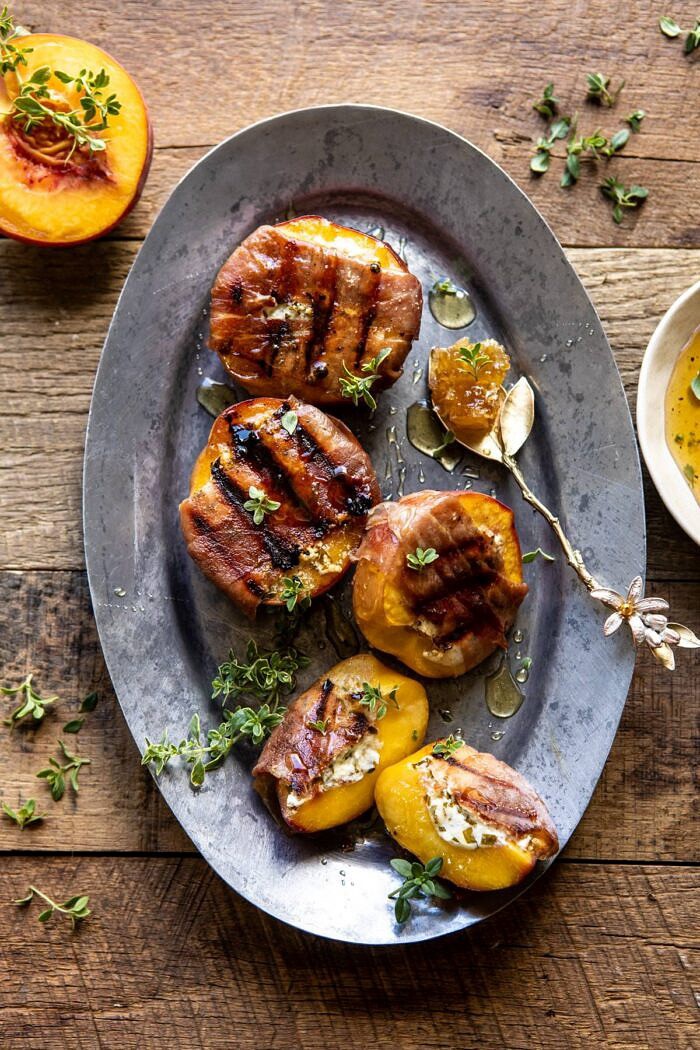 Prosciutto Goat Cheese Stuffed Peaches with Thyme Honey | halfbakedharvest.com #peaches #appetizer #goatcheese overhead photo of Prosciutto Goat Cheese Stuffed Peaches with Thyme Honey