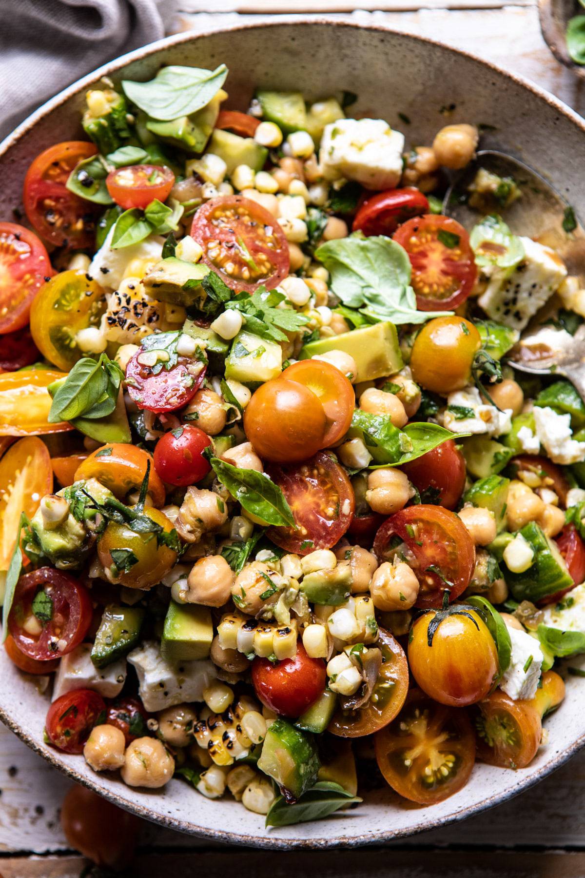 Corn, Tomato, and Avocado Chickpea Salad | halfbakedharvest.com #healthy #tomatosalad #quick #mealprep