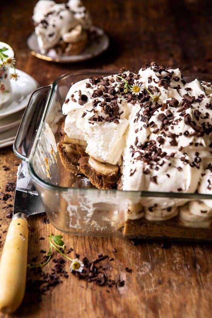 Healthier Banoffee Pie | halfbakedharvets.com #dessert #vegan #easyrecipes #healthy #chocolate #banana side angled photo of Healthier Banoffee Pie with slice taken out of pie