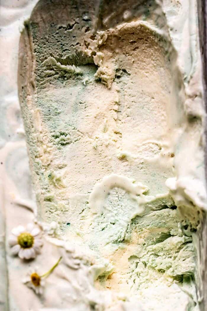 No Churn Minted White Chocolate Swirled Ice Cream | halfbakedharvest.com #icecream #easyrecipes #dessert #nochurnicecream overhead close up photo of No Churn Minted White Chocolate Swirled Ice Cream