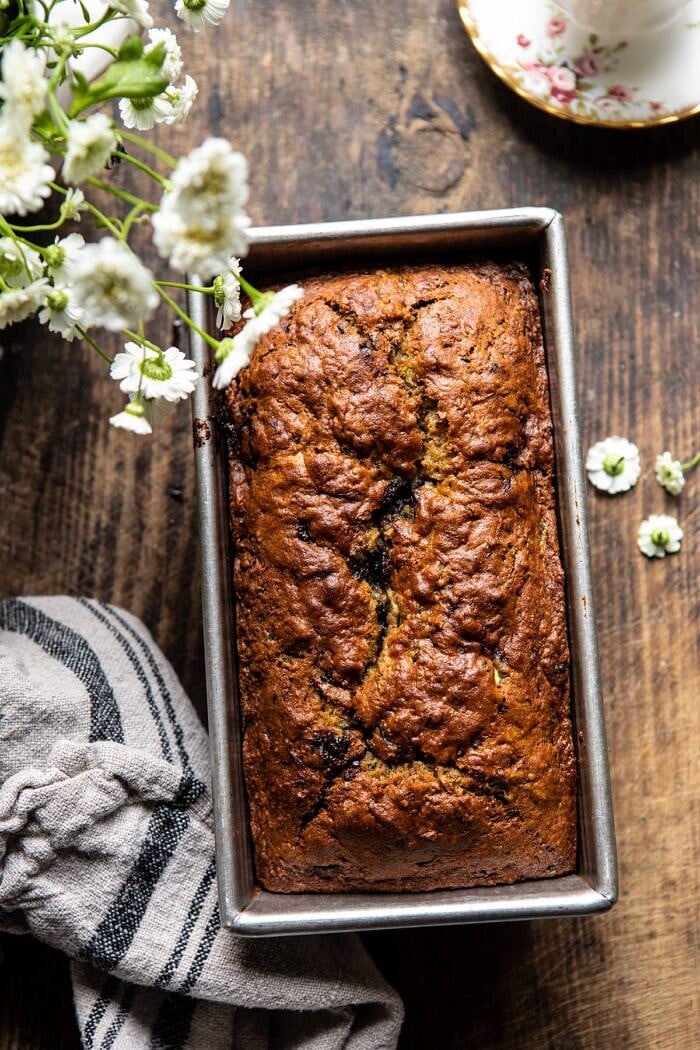 overhead photo of Sneaky Zucchini Chocolate Chunk Coconut Bread in baking pan after baking