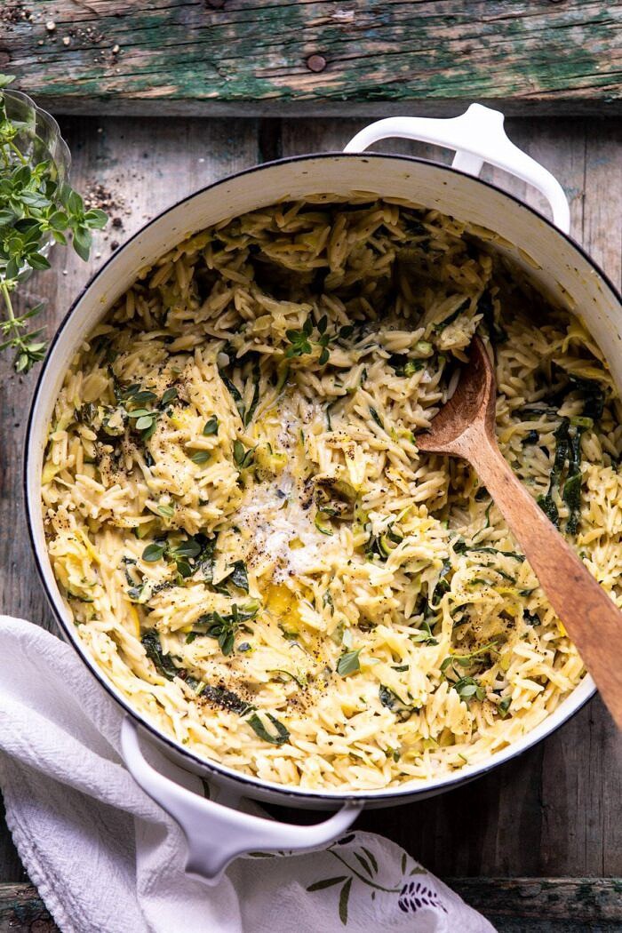 Souper Creamy Lemon Butter Cheesy Zucchini Orzo | halfbakedharvest.com #orzo #easyrecipes #zucchini overhead photo of Souper Creamy Lemon Butter Cheesy Zucchini Orzo