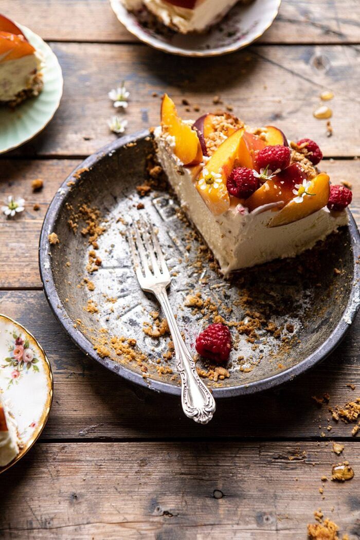 Peaches and Cream Pretzel Pie | halfbakedharvest.com #pie #peach #summer #dessert #easy side angled photo of Peaches and Cream Pretzel Pie slice in pie pan