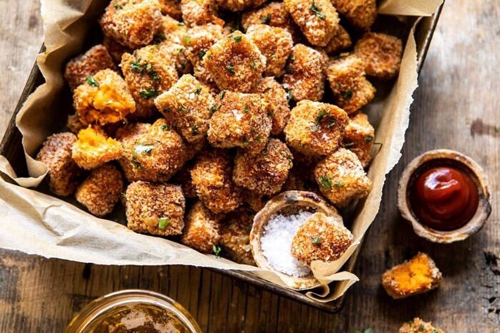 Baked Sweet Potato Parmesan Tater Tots | halfbakedharvest.com #sweetpotatoes #healthy #easyrecipes #gameday #tatertots horizontal photo of Baked Sweet Potato Parmesan Tater Tots