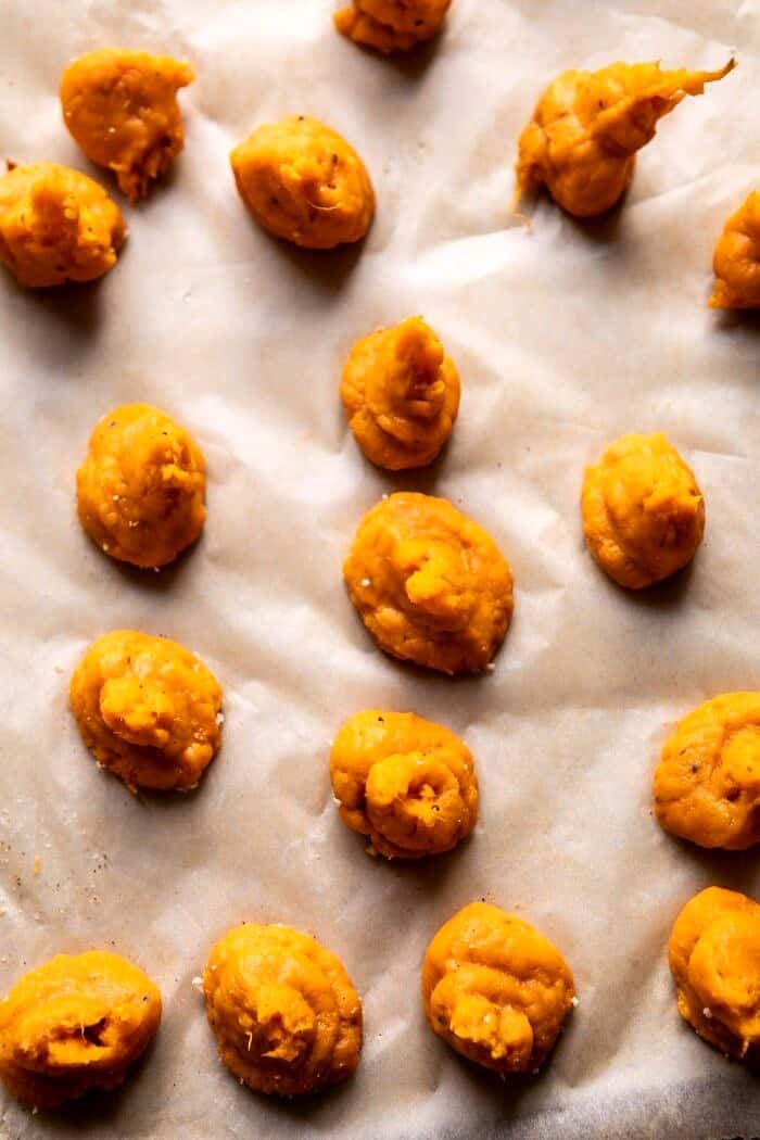 Baked Sweet Potato Parmesan Tater Tots | halfbakedharvest.com #sweetpotatoes #healthy #easyrecipes #gameday #tatertots ovehead photo of Sweet Potatoes before being coating in bread crumbs