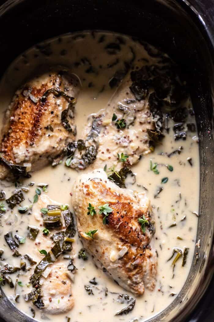 Slow Cooker French Wine and Mustard Chicken | halfbakedharvest.com #slowcooker #crockpot #instantpot #chicken overhead photo of Slow Cooker French Wine and Mustard Chicken in the slow cooker pot