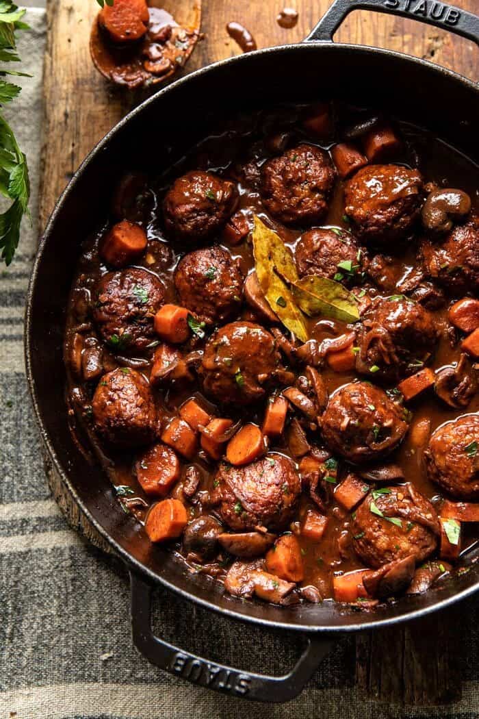 30 Minute Coq au Vin Chicken Meatballs with browned Butter Mashed Potatoes | halfbakedharvest.com #meatballs #easyrecipe #dinner overhead photo of 30 Minute Coq au Vin Chicken Meatballs in skillet