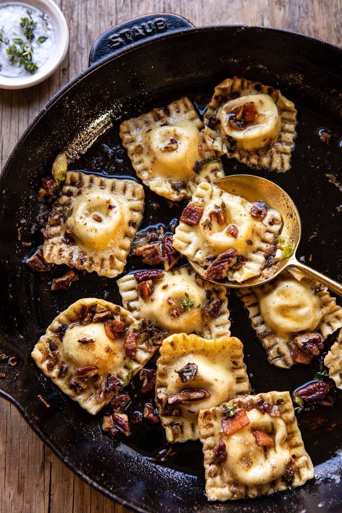 Brown Butter Brussels Sprout and Bacon Ravioli | halfbakedharvest.com #ravioli #pasta #easyrecipes #brusselssprouts overhead photo of Brown Butter Ravioli in skillet