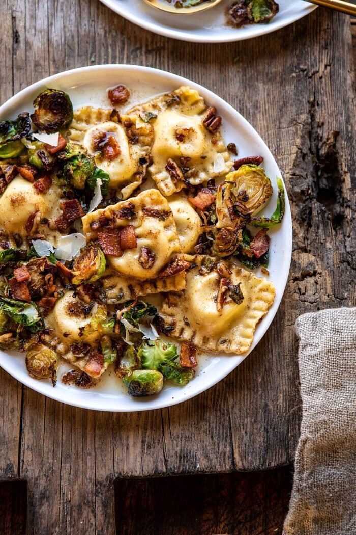 Brown Butter Brussels Sprout and Bacon Ravioli | halfbakedharvest.com #ravioli #pasta #easyrecipes #brusselssprouts overhead close up photo of Brown Butter Brussels Sprout and Bacon Ravioli