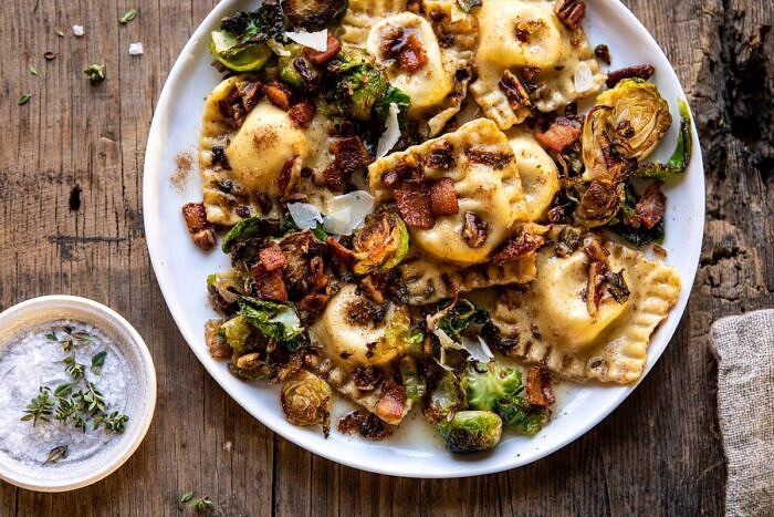 Brown Butter Brussels Sprout and Bacon Ravioli | halfbakedharvest.com #ravioli #pasta #easyrecipes #brusselssprouts horizontal overhead photo of Brown Butter Brussels Sprout and Bacon Ravioli