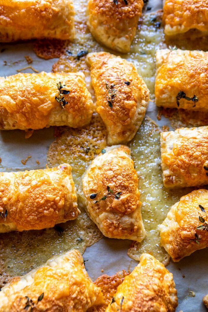 Creamy Broccoli and Butternut Squash Soup with Cheddar Brie Pastries | halfbakedharvest.com #soup #butternutsquash #cheese #fallrecipes overhead photo of Cheddar Brie Pastries on baking sheet