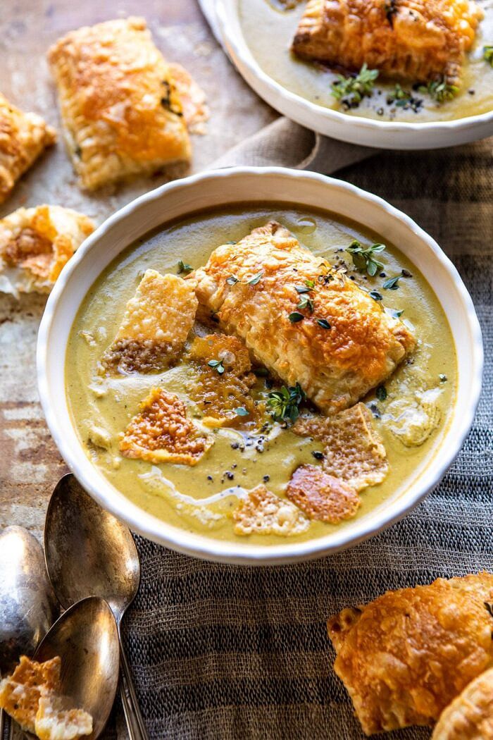 Creamy Broccoli and Butternut Squash Soup with Cheddar Brie Pastries | halfbakedharvest.com #soup #butternutsquash #cheese #fallrecipes side angled photo of Creamy Broccoli and Butternut Squash Soup with Cheddar Brie Pastries