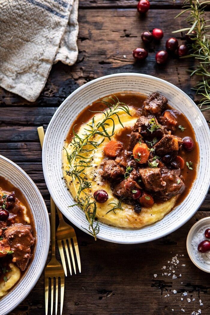 Cranberry Cider Braised Beef Stew with Rosemary Polenta | halfbakedharvest.com #slowcooker #instantpot #beef #polenta overhead photo of Cranberry Cider Braised Beef Stew with Rosemary Polenta