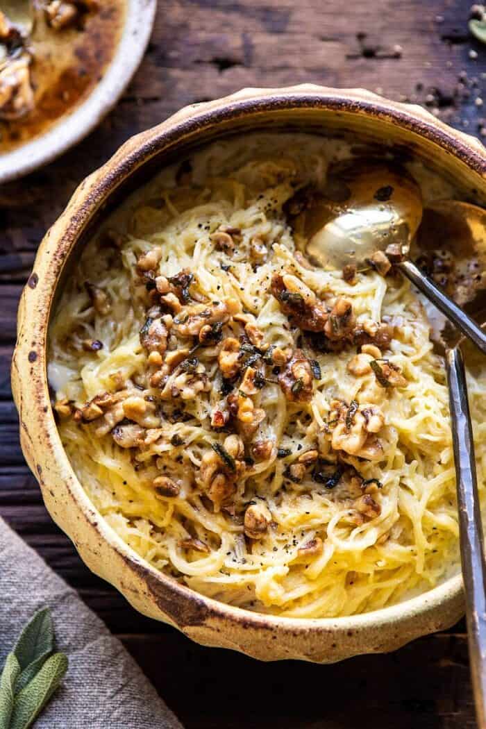 Creamed Spaghetti Squash with Browned Butter Walnuts | halfbakedharvest.com #spaghettisquash #healthy #thanksgiving #sage overhead photo of Creamed Spaghetti Squash with Browned Butter Walnuts