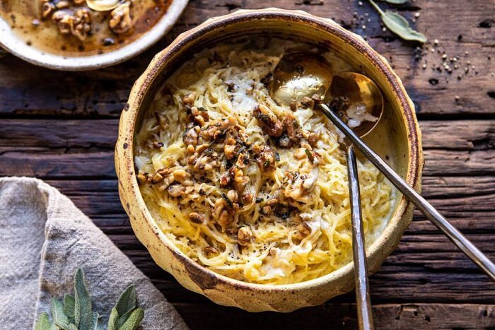 Creamed Spaghetti Squash with Browned Butter Walnuts | halfbakedharvest.com #spaghettisquash #healthy #thanksgiving #sage overhead horizontal photo of Creamed Spaghetti Squash with Browned Butter Walnuts