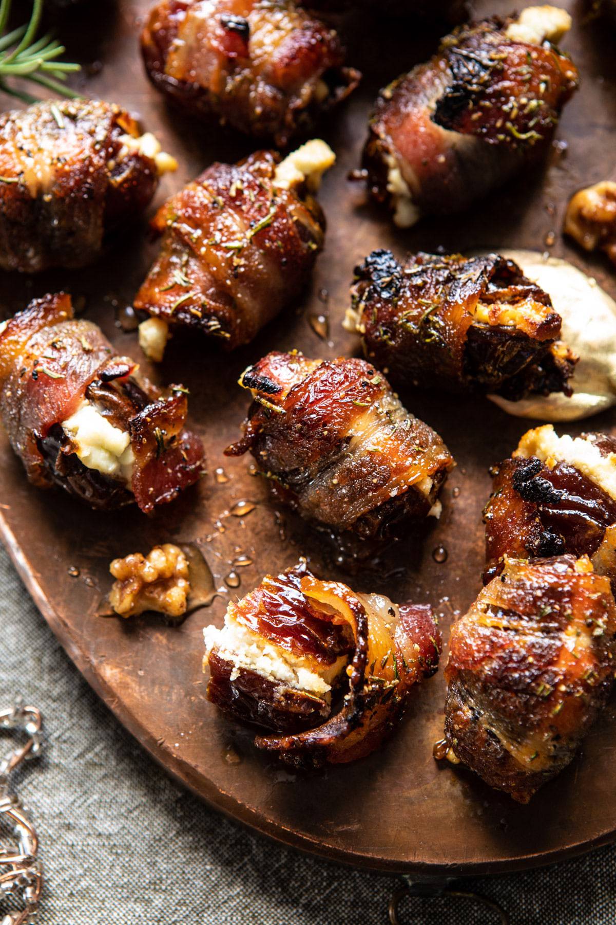 Goat Cheese Stuffed Bacon Wrapped Dates with Rosemary Honey | halfbakedharvest.com #dates #goatcheese #thanksgiving #appetizer