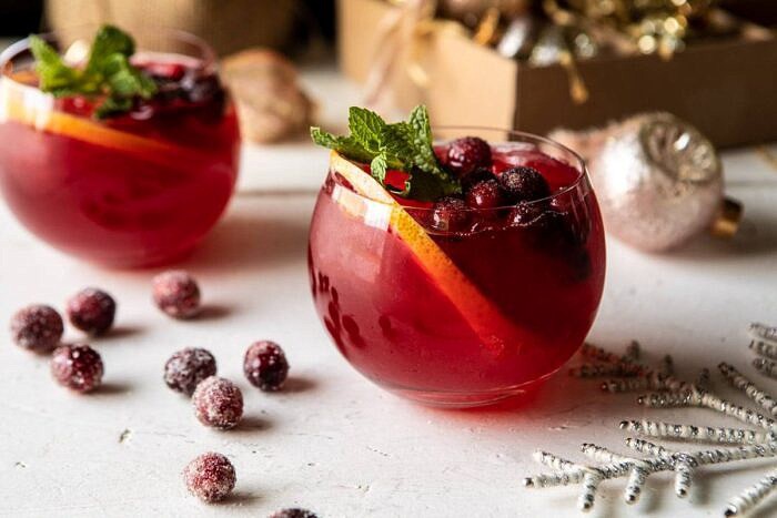 Jingle Bell Cranberry Paloma | halfbakedharvest.com #tequila #christmasdrinksaturday #holiday horizontal photo of Jingle Bell Cranberry Paloma