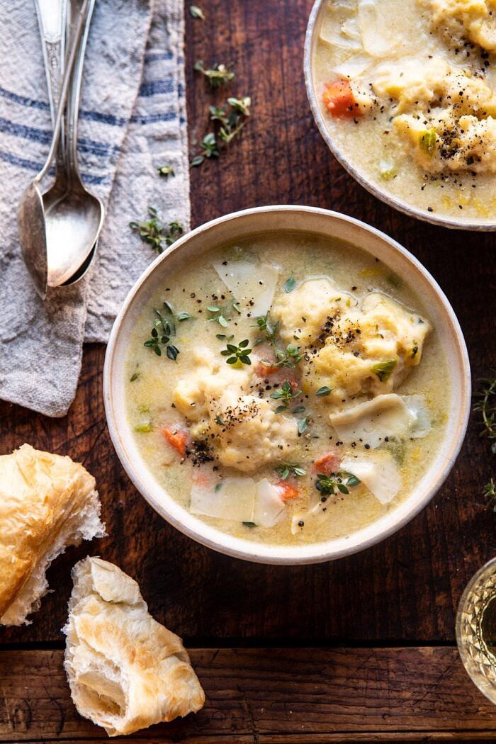 One Pot Creamy Turkey and Potato Dumplings | halfbakedharvest.com #turkey #dumplings #thanksgiving overhead photo of One Pot Creamy Turkey and Potato Dumplings in soup bowls