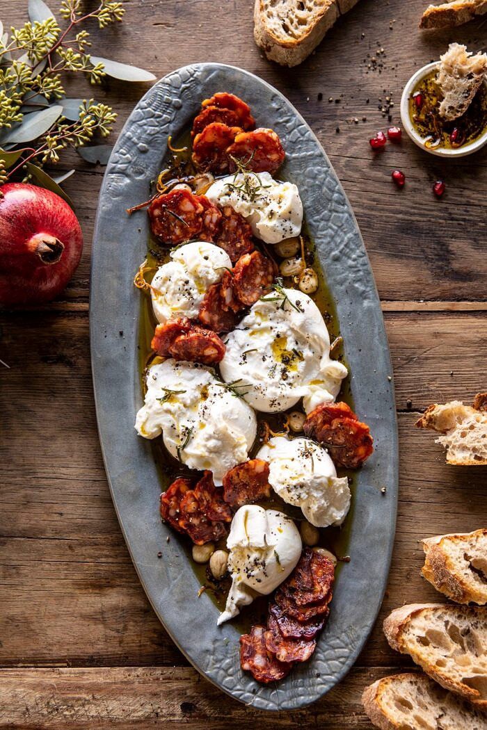 Burrata with Lemon Pepper Salami Bites | halfbakedharvest.com #burrata #appetizer #christmas overhead photo of Burrata with Lemon Pepper Salami Bites on serving platter