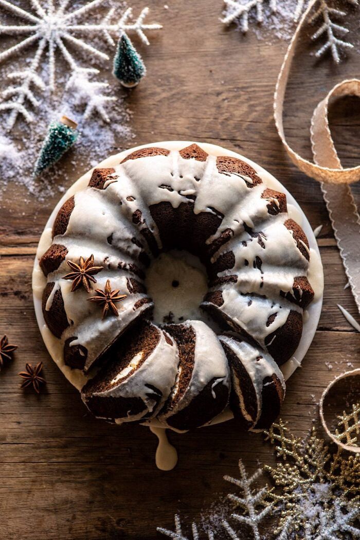 overhead photo of Cream Cheese Swirled Chai Gingerbread Cake with 3 pieces of cake cut