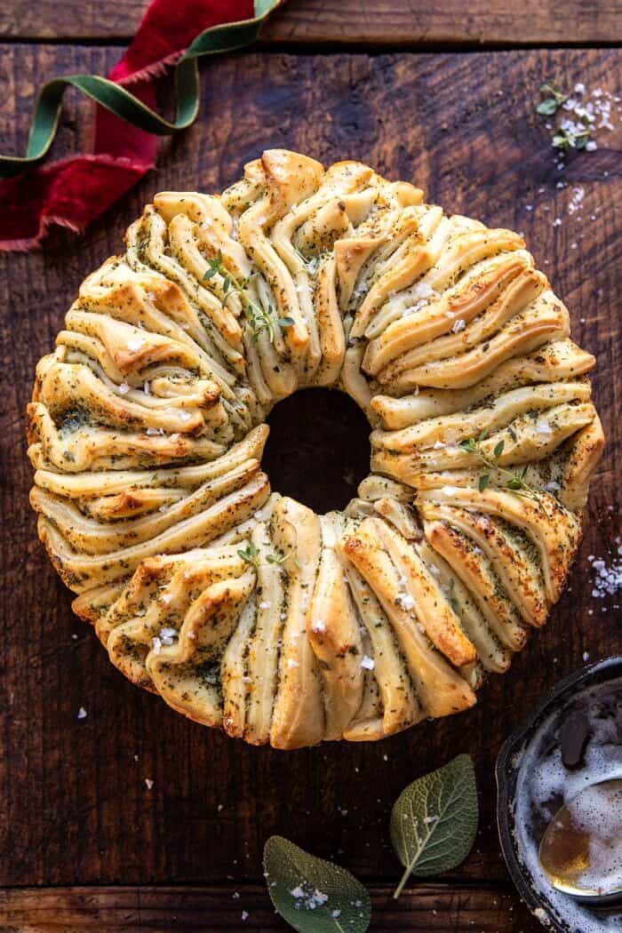 Pull-Apart Garlic Butter Bread Wreath | halfbakedharvest.com #garlicbread #Christmas overhead close up photo of Pull-Apart Garlic Butter Bread Wreath