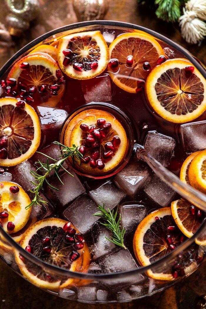 Sparkling Christmas Party Punch | halfbakedharvest.com #punch #christmasdrinks #cocktails overhead photo of Sparkling Christmas Party Punch in punch bowl