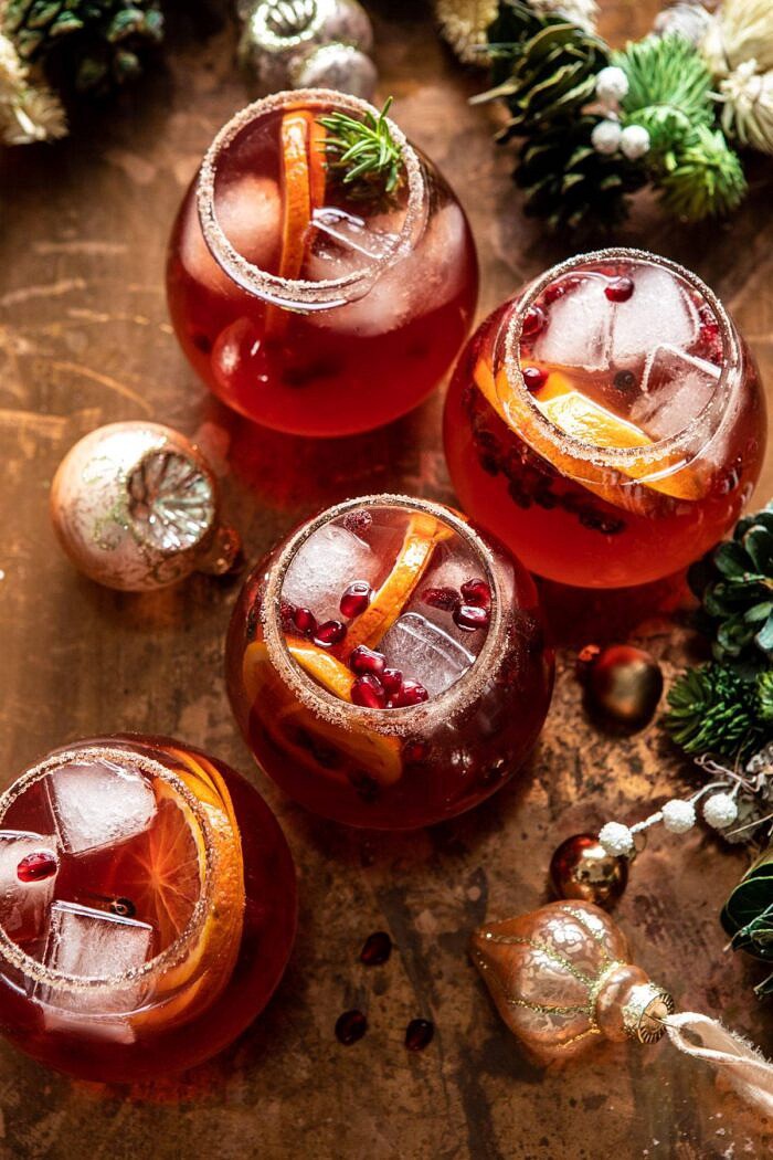 Sparkling Christmas Party Punch | halfbakedharvest.com #punch #christmasdrinks #cocktails overhead photo of Sparkling Christmas Party Punch in 4 glasses