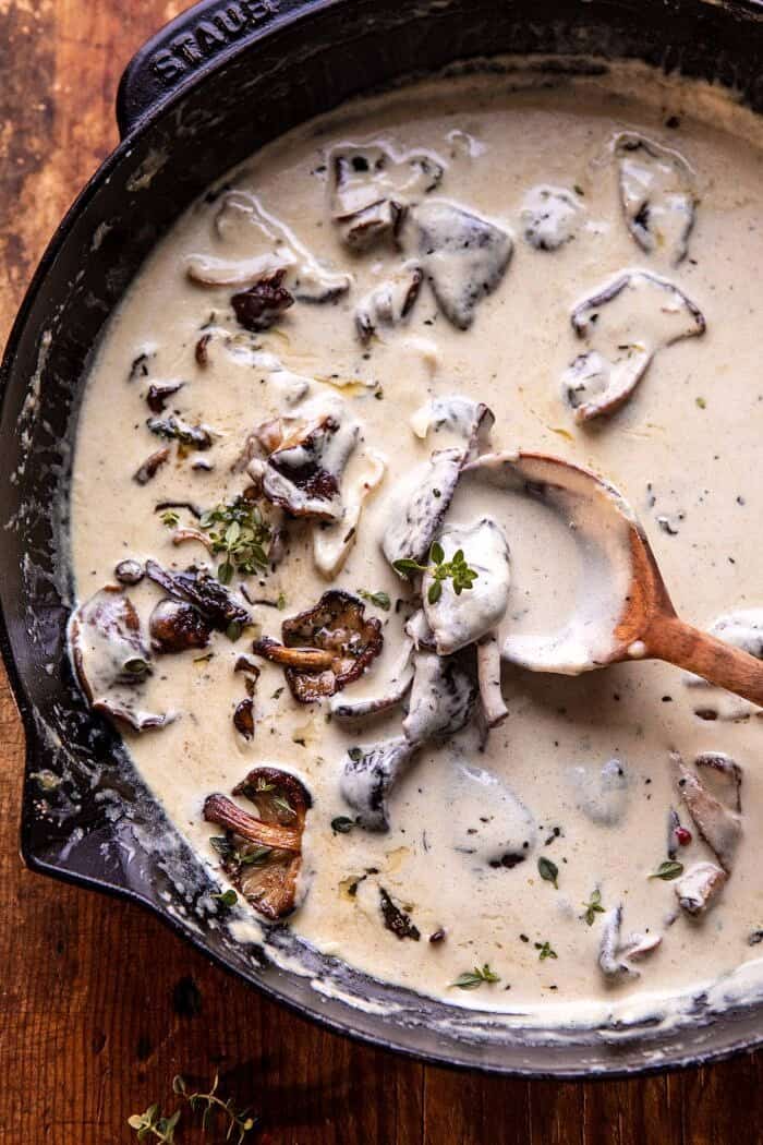 White Wine Braised Short Ribs with Buttered Mushroom Cream Sauce | halfbakedharvest.com #slowcooker #crockpot #shortribs #holiday #christmas overhead photo of Buttered Mushroom Cream Sauce