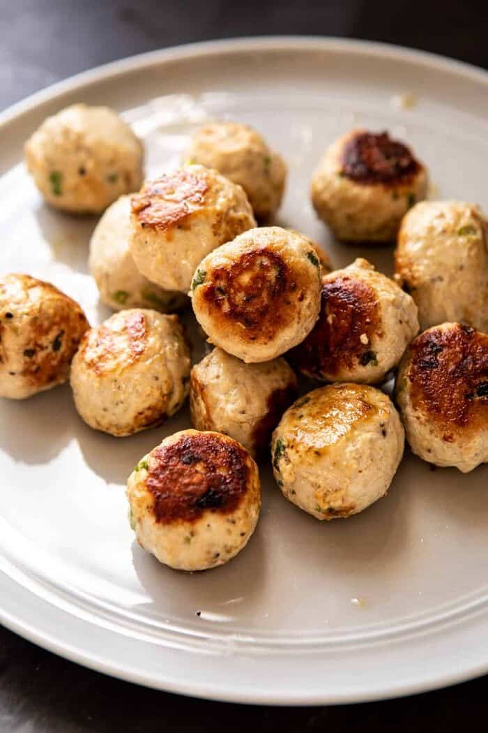 30 Minute Thai Chicken Meatball Khao Soi | halfbakedharvest.com #thai #coconut #healthy meatballs after searing