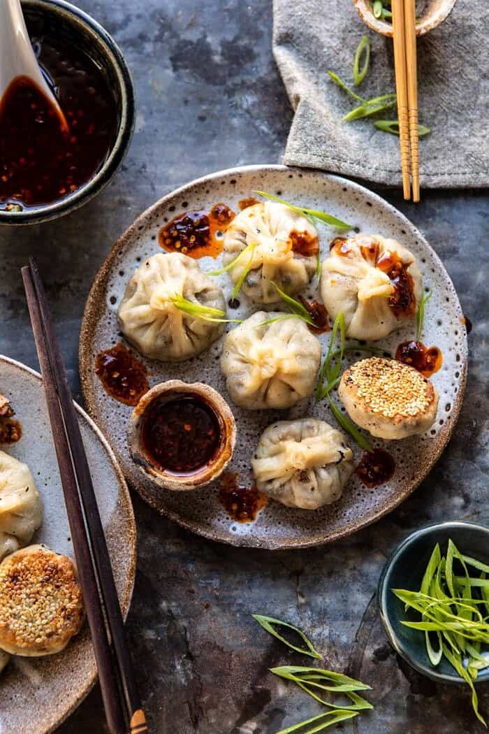 Chinese Mushroom Dumplings with Sweet Chili Ginger Sesame Sauce | halfbakedharvest.com #dumplings #potstickers #chinese overhead photo of Chinese Mushroom Dumplings with Sweet Chili Ginger Sesame Sauce