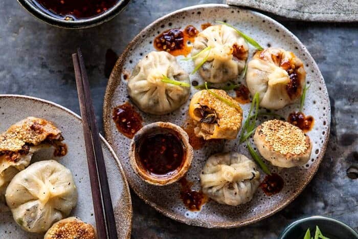 Chinese Mushroom Dumplings with Sweet Chili Ginger Sesame Sauce | halfbakedharvest.com #dumplings #potstickers #chinese overhead horizontal photo of Chinese Mushroom Dumplings with Sweet Chili Ginger Sesame Sauce