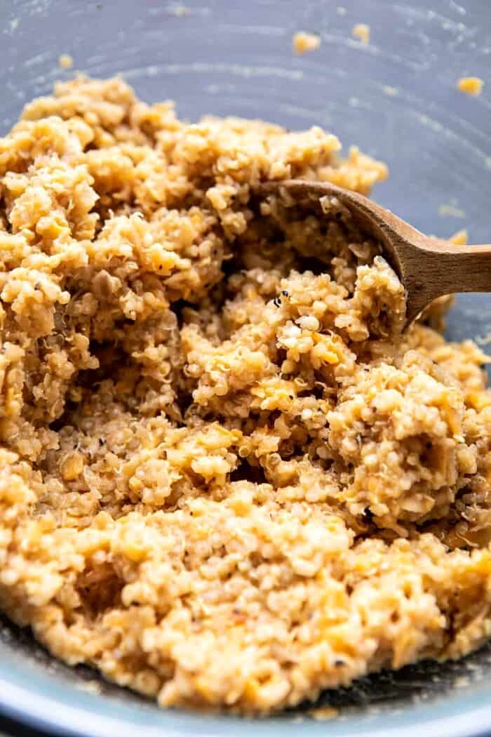 Crispy Quinoa Burgers Topped with Sweet Potato Fries and Beer Caramelized Onions | halfbakedharvest.com #quinoaburger quinoa burger mixer before forming the burgers