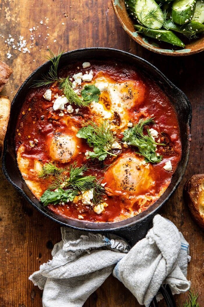 Eggs in Purgatory with Chile Butter and Feta | halfbakedharvest.com #breakfastrecipe #eggs overhead photo of Eggs in Purgatory with Chile Butter and Feta