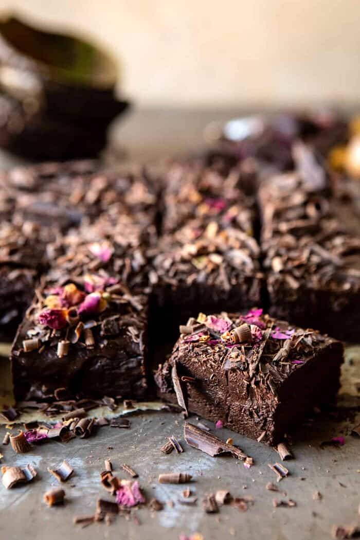 Fudgy Avocado Brownies with Chocolate Fudge Frosting | halfbakedharvest.com #brownies #healthy side angle photo of Fudgy Avocado Brownies with Chocolate Fudge Frosting