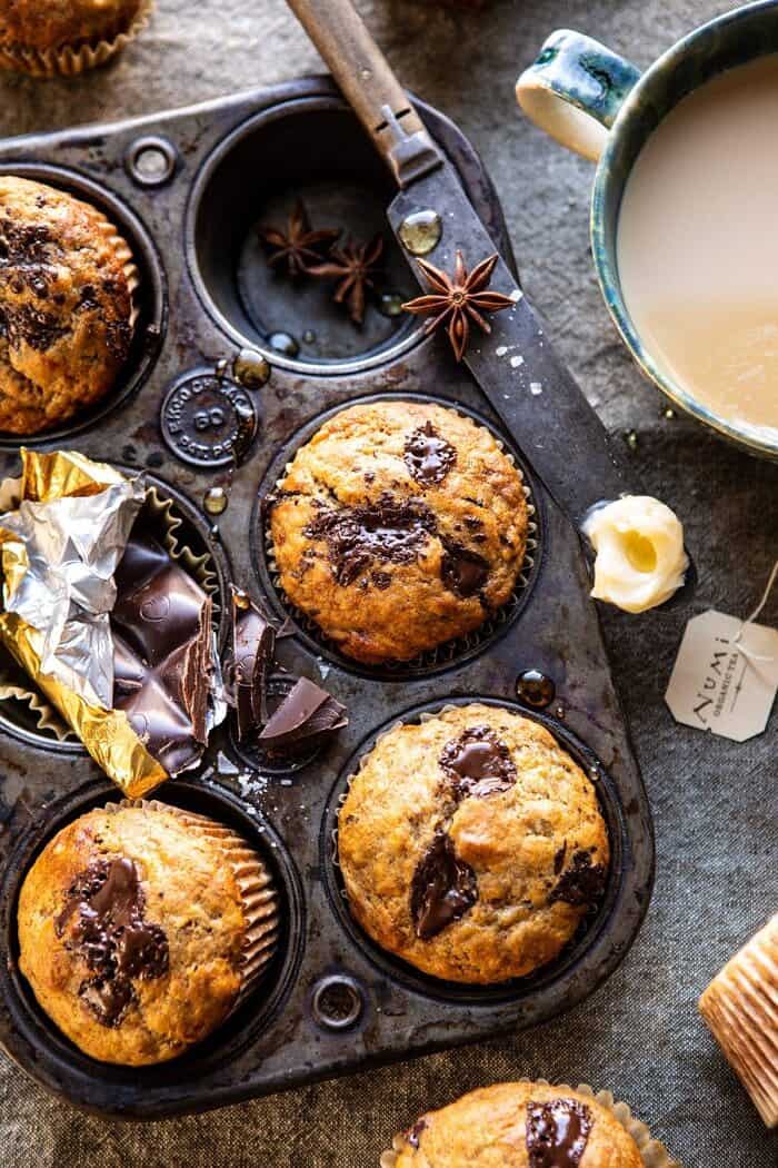 One Bowl Chocolate Chunk Chai Banana Muffins | halfbakedharvest.com #healthy #bananabread #muffin overhead photo of One Bowl Chocolate Chunk Chai Banana Muffins