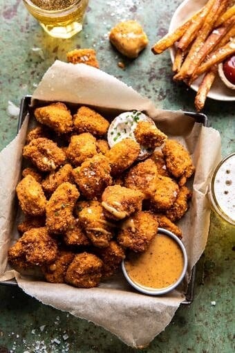 Oven Fried Cajun Popcorn Chicken with Creamy Honey Mustard | halfbakedharvest.com #chickenfingers #easyrecipes